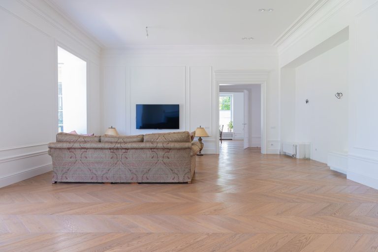 Wide-plank hardwood floor installation in a bright Pennsylvania living room